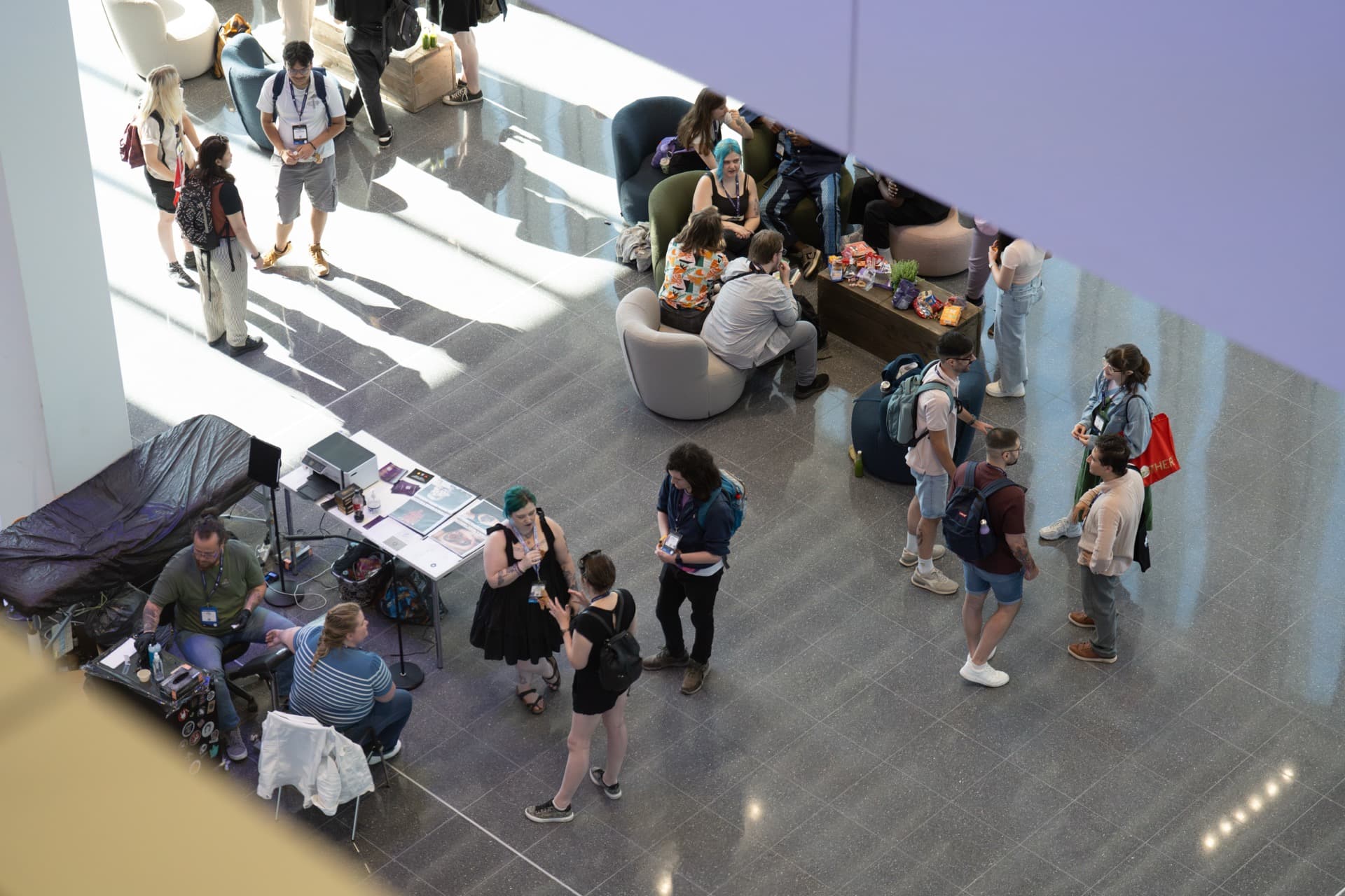 Attendees networking in the Confex lobby